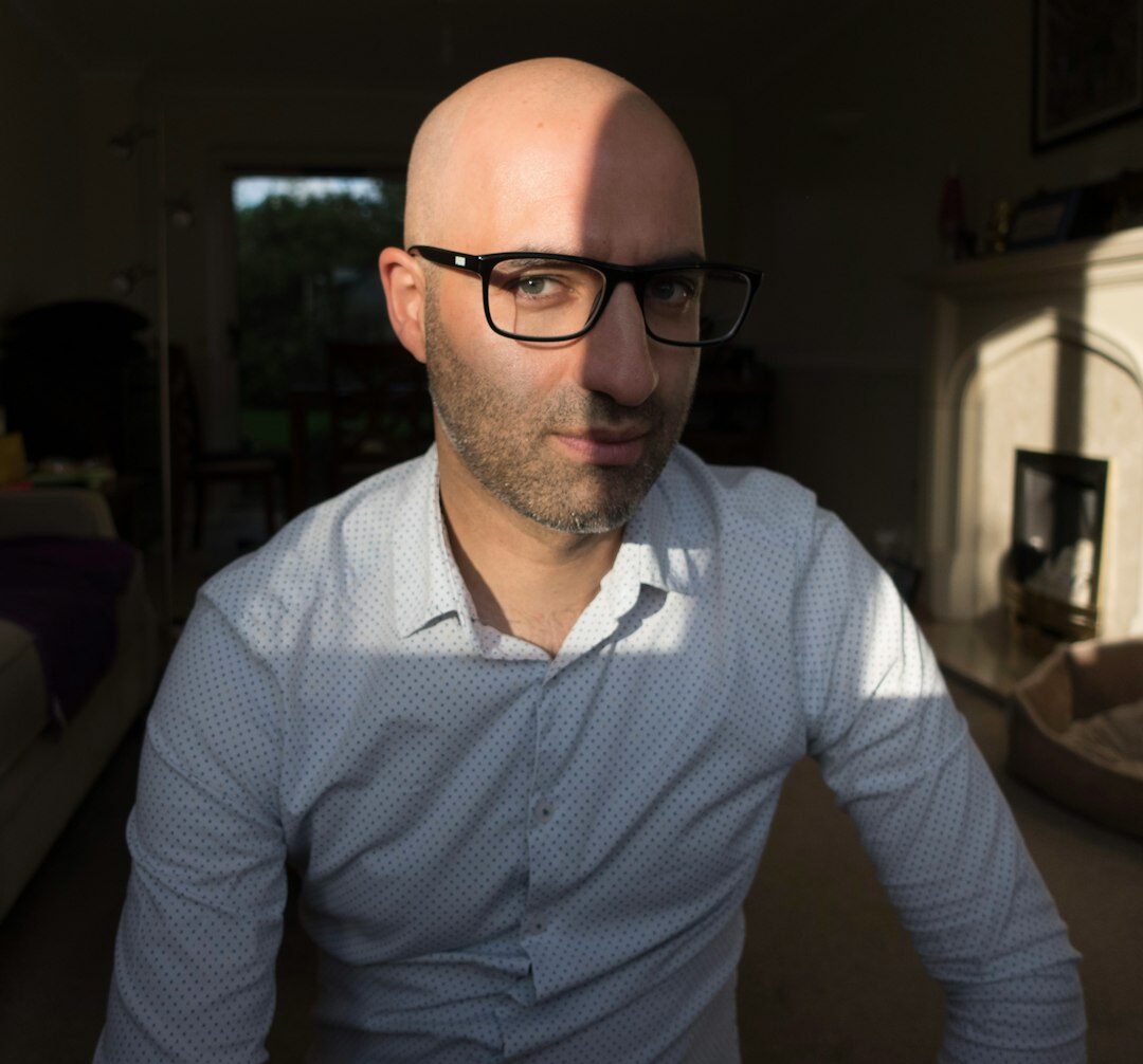 Professional portrait of a male technology expert with confident expression